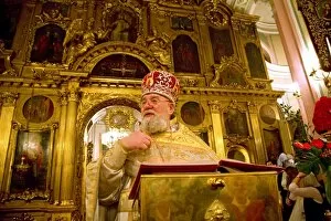 Russia; St. Petersburg; The High Priest talking to believers during the Russian Orthodox Easter ceremony at