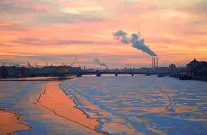 Sun Set Prints: Russia, St. Petersburg; The last light over the partly frozen Neva River with in Winter