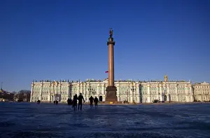 Russia, St. Petersburg; People standing in front of the State Hermitage Museum