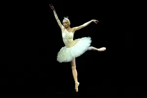 Theatre Prints: Russia, St. Petersburg; The Prima Ballerina playing the Swan Princess Odette during a solo in Tchaikovsky s