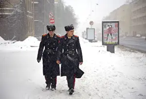 Historical Centre Prints: Russia, St. Petersburg; Two student soldiers walking in a snow storm