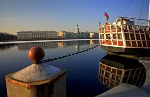 V Iew Gallery: Russia, St. Petersburg; A wooden ship at pier on the partly frozen Neva River with the Kunstkamera