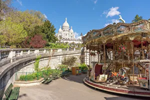 Images Dated 9th February 2023: Sacre Coeur, Montmartre, Paris, France. Carousel in foreground