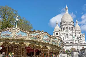Images Dated 9th February 2023: Sacre Coeur, Montmartre, Paris, France. Carousel in foreground