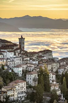 Images Dated 22nd April 2022: Sacro Monte of Varese an in background the sea of fog during sunrise, Varese, Lombardy, Italy