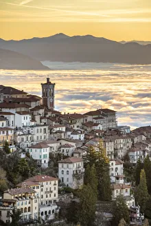 Sacro Monte of Varese an in background the sea of fog during sunrise, Varese, Lombardy, Italy