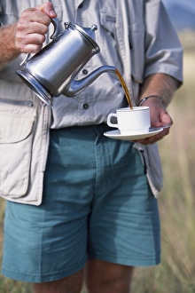 Wildlife Park Gallery: Safari guide pours coffee, Elsas Kopje