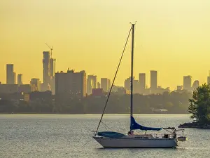 City Skyline Prints: Sailboat anchored in Humber Bay on Lake Ontario in Toronto, Ontario, Canada