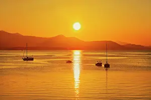 Industry Prints: Sailboats at sunset on Vesuvius Bay