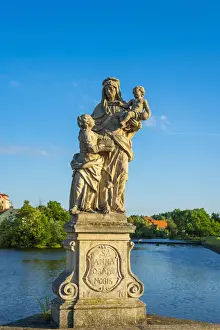 Bohemia Prints: Saint Anne sculpture on Pisek Stone Bridge which is the oldest stone bridge in the Czech Republic