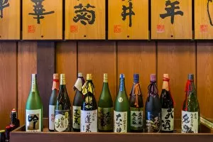Japan Gallery: Sake bottles in a sake brewery, Takayama, Gifu Prefecture, Japan