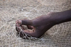 Handmade Prints: Salima, Malawi Lake, Africa. Hand of a net weaver