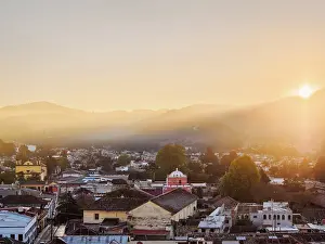 Flare Prints: San Francisco de Asis Church and Arco del Carmen at sunrise