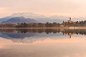 San Giuseppe Church and Bosisio Parini lakefront reflected in the Pusiano lake with