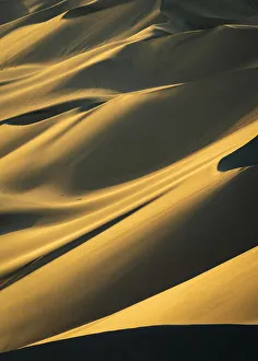 Atacama Prints: Detail of sand dunes in desert at Huacachina at sunset, Ica Region, Peru