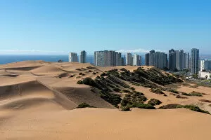 Images Dated 13th September 2022: Sand dunes and residential high-rise buildings, Concon, Valparaiso Province, Valparaiso Region