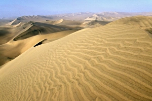 Huacachina Prints: Sand dunes stretch into the distance