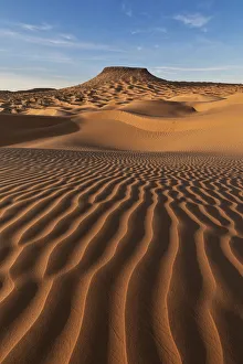Deserted Gallery: Sand dunes with Tim Bejin mountain, Sahara desert, Tunisia, Northern Africa
