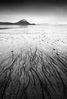Lofoten Prints: Sand patterns create an eye-catching foreground at Haukland beach on a gloomy summer morning