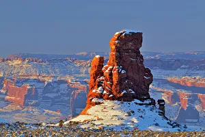 Eroded Prints: Sandstone pinnacles ina winter landscape, Arches National Park, Utah, USA