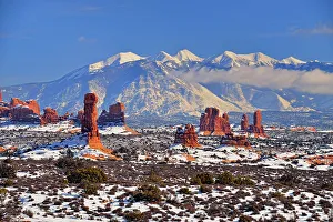 Eroded Prints: Sandstone spires and La Sal Mpuntains in winter, Arches National Park, Utah, USA