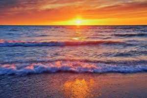 Orange Prints: Sandy beach on Lake Huron at sunset Grand Bend, Ontario, Canada