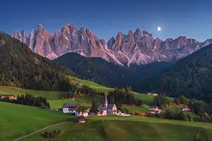 South Tyrol Prints: Santa Magdalena church, with the Odle rising tall in the background. Dolomites, Italy