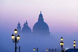 Santa Maria della Salute church in the mist; Venice, Veneto, Italy