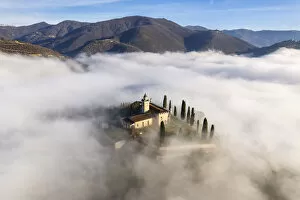 Above The Clouds Gallery: Santissima di Gussago over the clouds in Franciacorta, Brescia province in Lombardy, Italy