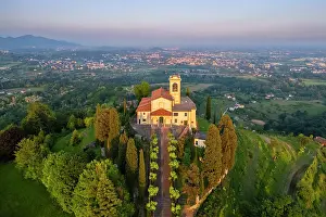 Vine Prints: Santuario della Beata Vergine del Carmelo at the top of a hill at sunset in spring