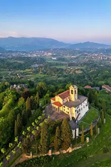 Vine Prints: Santuario della Beata Vergine del Carmelo at the top of a hill at sunset in spring