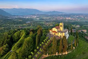 Vine Prints: Santuario della Beata Vergine del Carmelo at the top of a hill at sunset in spring