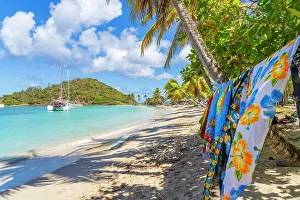 Images Dated 5th April 2023: Sarongs for sale on Salt Whistle bay Beach, Mayreau Island in the Tobago Cays in the Grenadines