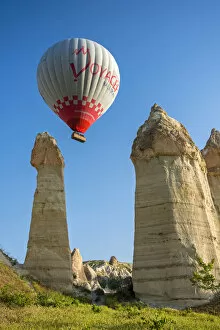 Images Dated 23rd June 2015: Scenic fairy chimneys landscape with hot air balloon, Goreme, Cappadocia, Turkey