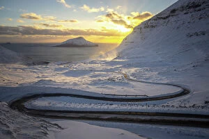 Wind Collection: The scenic road in Norðradalur at sunset. Island of Streymoy