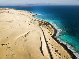 Scenic route in Fuerteventura, Corralejo sand dunes and ocean. Canary islands