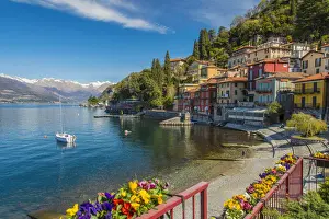 Springtime Prints: Scenic springtime view of Varenna with snowy Alps in the background, Lake Como, Lombardy