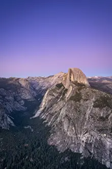 Scenic view of Half Dome granite rock formation at Yosemite National Park after sunset