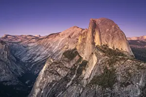Scenic view of Half Dome granite rock formation at Yosemite National Park after sunset