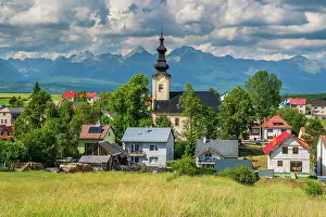 Townscape Prints: Scenic view of the village with Tatra mountains in the background