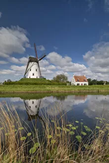 De Schell Molen Windmill Refecting in Damme Canal, Damme, Belgium