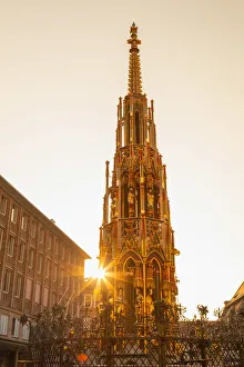 Schoner Brunnen fountain at sunrise, Nuremberg, Bavaria, Germany