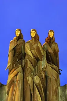 The sculpture Three Muses by Stanislovas Kuzma crowning the main entrance to the National Drama Theatre has become an icon of Vilnius. The muses of Drama (Calliope), Comedy (Thalia) and Tragedy (Melpomene). Vilnius, Lithuania