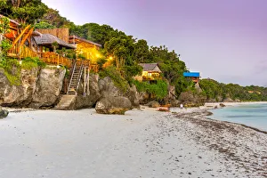 Sulawesi Prints: Sea cottages on the beach at dusk, Beach, Bira, Sulawesi, Indonesia