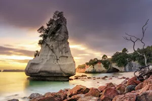 Relaxation Gallery: Sea stack at Cathedral Cove at sunrise, Coromandel, New Zealand