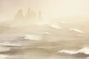 Sea Stacks Prints: Sea stacks near Reynisfjara beach during sunrise in winter from Dyrholaey