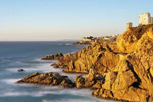 Seascape of rock formations by Roca Oceanica at sunset, Concon, Valparaiso Province, Valparaiso Region, Chile