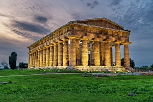 Campania Prints: Second Temple of Hera (Temple of Neptune) lit up at dusk, Paestum, Campania, Italy