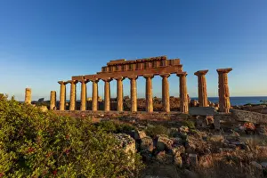 Selinunte, Sicily. Greek temple at sunset with the sea in the background