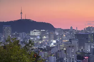 Seoul Tower and cityscape at sunset, Seoul, South Korea